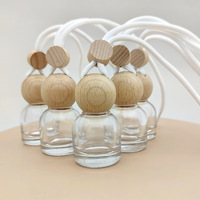 Diffuseur de parfum pour voiture en verre avec bouchon en bois écologique, disponible en forme ronde, fraîcheur durable