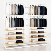 Étagère de présentation de vêtements en métal noir double face à deux niveaux avec étagères en bois et base en U – Vente en gros