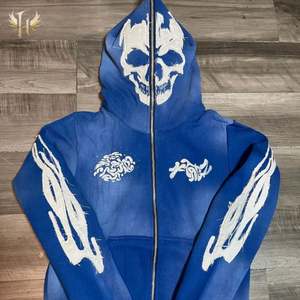 Sweat à capuche unisexe avec crâne surdimensionné et fermeture éclair, logo personnalisé, style Street Wear, patch de broderie en détresse 100% coton brut - Product Image 3