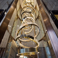 SHENGQIU Projet Personnalisé Hôtel Or Moderne De Luxe K9 Cristal Grand Escalier De Luxe Anneaux Haut Plafond Lustre Usine