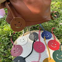 Porte-clés en cuir PU coloré et durable, pendentif de sac mignon en forme de sourire porte-bonheur pour clés de voiture pour femmes