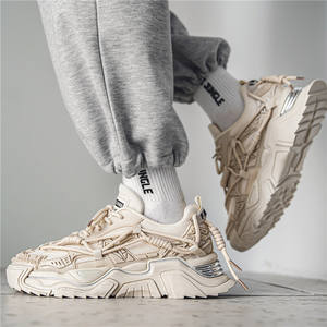 Mocasines modernos de estilo para las cuatro estaciones para jóvenes, zapatos con cordones de color liso, nuevos zapatos deportivos para hombre para exteriores. - Product Image 1