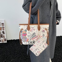 Sac fourre-tout graffiti grande capacité pour femme, sac à main mignon en PU avec fermeture éclair, sac à bandoulière élégant pour l'université, la plage ou le travail