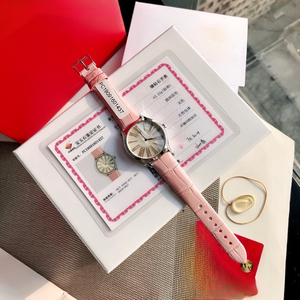 Reloj de lujo de alta gama con movimiento de cuarzo preciso, caja de metal precioso, correa de cuero, esfera degradada, marcadores de hora con números romanos. - Product Image 1