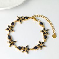 Nouveau bracelet avec strass en forme de goutte d'eau, bracelet en acier inoxydable à fleurs