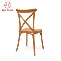 Nouvelle bonne qualité dos croisé Orange bleu PP résine meubles de salle à manger de mariage hôtel moderne chaise en plastique pour les événements