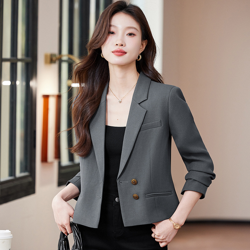 Grey suit brooch
