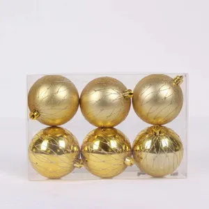 Artículos de venta superior 6cm Adornos de decoración dorada Diseño de copo de nieve brillante Bola de Navidad de plástico pintada