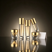 Ensemble de flacons en verre transparent avec bouchon doré facetté pour emballage cosmétique, logo personnalisé pour marque et étiquette privée