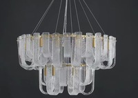 Lustre d'art moderne Cuit en forme de U Pièce incurvée Verre Cadre en cuivre Lustre de salon