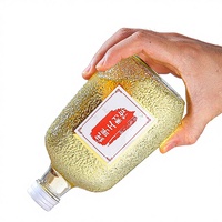 Bouteilles en verre sérigraphiées pour jus, fruits, vin et boissons avec bouchon rotatif en aluminium et design estampé or (100/200/300ml)