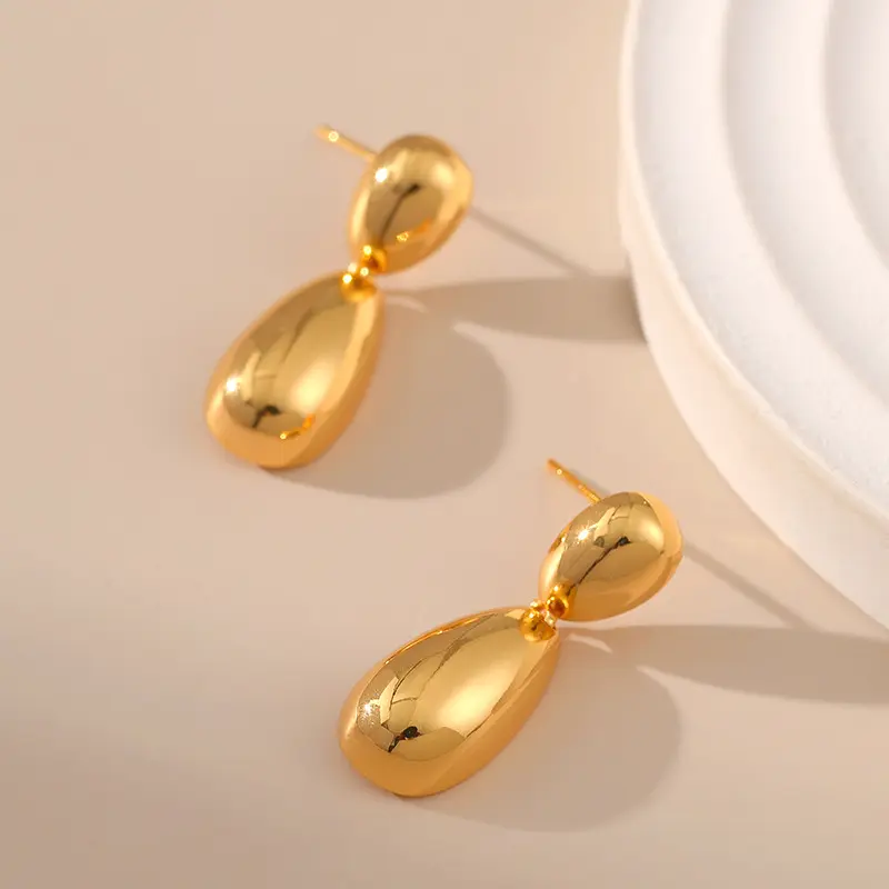 Stilvolle Hot Selling Glatte Wasser tropfen Ohrringe Melonen samen Anhänger Geometrische Ohrringe Gold Ohr stecker