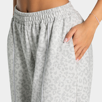 Pantalon de jogging large personnalisé avec étiquette imprimée et passepoil léopard noir, en coton respirant pour femme