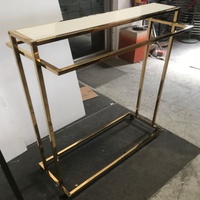 Estante Expositor Dorado para Tienda, Mueble de Metal y Madera para Tienda de Ropa, Acero y Madera con Superficie Pulida, Empacado en Caja de Cartón