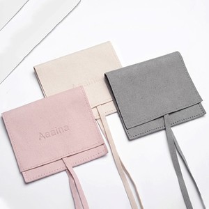 Pochette de luxe en velours avec logo, sac à cordon, sac à bijoux en daim, sacs cadeaux anti-poussière en velours avec ruban et nœud - Product Image 1