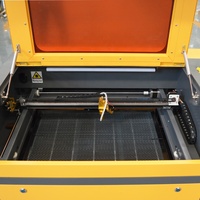 Machine de gravure laser CO2 portable ActionLasers 6090 avec refroidissement par eau et prise en charge CNC pour les formats DXF/LAS
