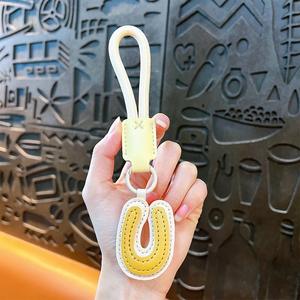 Llaveros de Cuero con Letras del Alfabeto Inglés (26 Letras), Precio de Fábrica, Llavero para Mochila, DIY, Cuerda de Nailon Colorida, Letras Iniciales - Product Image 4