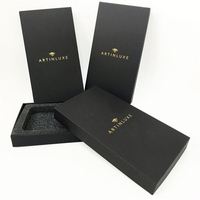 Boîte cadeau pour montre en papier rigide noir magnétique avec insert en mousse, pelliculage mat et gaufrage, papier couché