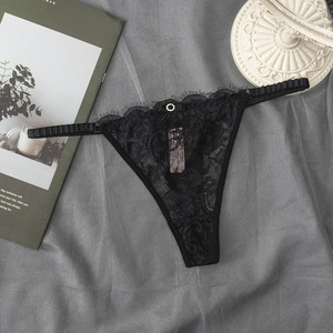 Tanga de encaje transparente negro para mujer con lazo, tirantes finos, tiro bajo, lencería sexy transpirable, venta al por mayor - Product Image 1