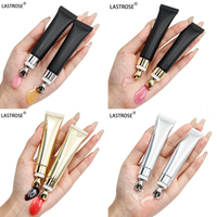 Gloss repulpant transparent végétalien avec applicateur massant métallique, tube souple, huile à lèvres, marque privée, gloss à lèvres brillant aux peptides