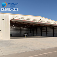 Hangar en acier pour avions à l'aéroport – Bâtiment de qualité supérieure avec porte spéciale et mur en panneaux sandwich