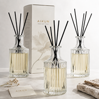 AIKUN Diffuseur de parfum d'ambiance en gros avec logo personnalisé, ensemble de diffuseurs à bâtonnets en verre et rotin