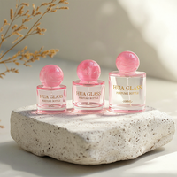 Meistverkaufte Klare Transparente Bedruckbare 30ml 50ml 100ml Leere Parfümflasche mit Harzkugelkappe Glasflasche mit Verpackungsbox