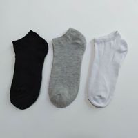 Chaussettes d'affaires jetables pour hommes, coupe basse, style sport, en noir, blanc et gris, vente en gros à prix réduit