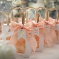 Sac en papier transparent pour cadeaux d'anniversaire et de fêtes, vente en gros, sac de remerciement avec rembourrage en papier déchiqueté