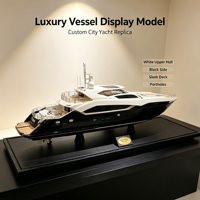 Modèle de yacht urbain personnalisé avec coque noire et blanche et support d'exposition