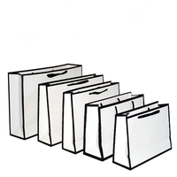 Sac cadeau en papier blanc, matériau en papier couché, emballage de pantalon, vente au détail, grand sac à poignée, emballage de vêtements de luxe pour femmes