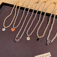 Nouveau collier coréen en perles édition limitée, polyvalent et élégant, chaîne de col en forme de cœur pour femme, accessoires de perles de qualité luxueuse, vente en gros