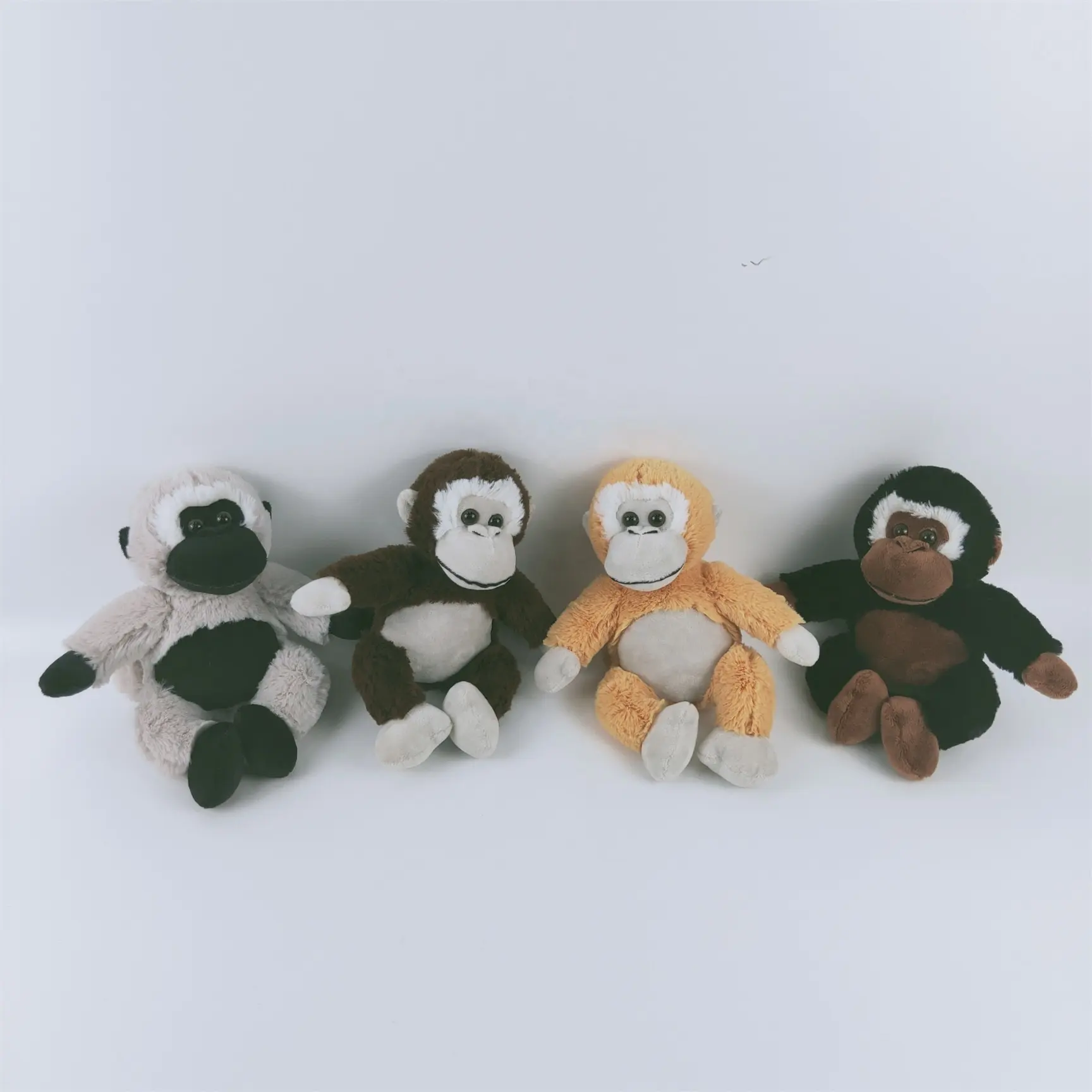 Klasik hayvan oyuncak peluş siyah maymun yumuşak oturan maymun oyuncak dolması sevimli maymun