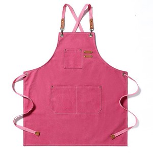 Tablier sans manches en toile anti-salissure couleur personnalisée, imprimé rose, à bretelles croisées, pour maquilleurs et baristas - Product Image 1