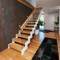 Escalier intérieur monobloc de style européen moderne avec garde-corps en acier, bois et verre, sur mesure, à double poutre oblique
