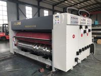 Alimentateur de chaîne semi-automatique pour impression flexographique, rainurage et découpe rotative de cartons ondulés