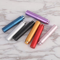 Vente en gros d'accessoires de voyage : Mini atomiseur de parfum rechargeable, flacon échantillon en aluminium à bouchon rotatif, emballage pour huiles essentielles capillaires