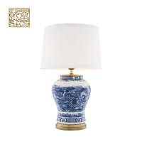 Lampe de table électrique noire en céramique de style nordique moderne de luxe avec abat-jour tambour pour chambre à coucher (vente en gros)