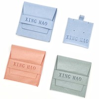 Logo personnalisé de luxe microfibre anneaux collier sac de rangement insérer haut de gamme petite enveloppe bijoux emballage pochette