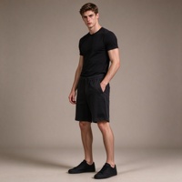 Shorts texturés noirs pour hommes, taille élastique, cordon de serrage, poche latérale fendue, poche arrière, coupe décontractée, longueur mi-longue, shorts décontractés