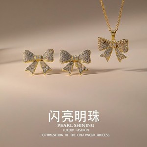 Conjunto de pendientes y collar con lazo de perlas brillantes, aleación de cobre chapada en oro, joyería de fiesta, moda de lujo para mujer - Product Image 1