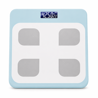 Balance connectée Bluetooth intelligente avec écran LCD en verre trempé bleu clair et affichage de la température pour un pesage corporel précis à domicile