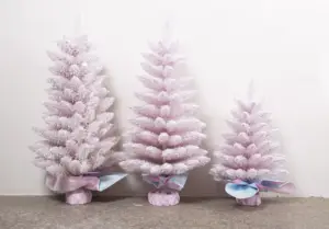 Vente en gros de petits sapins de Noël roses artificiels en PVC PE tombant sous la neige de haute qualité