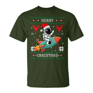 Camiseta con diseño de astronauta navideño feo montado en una cohete y sombrero de Papá Noel - Product Image 1