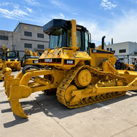 Bulldozer à chenilles robuste CAT D6M pour la remise en état des terres agricoles et l'installation de systèmes de drainage