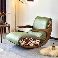 Fauteuil à bascule extensible en bois de style nordique moderne et luxueux avec revêtement en cuir rembourré pour