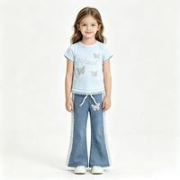 Ensemble décontracté 2 pièces d'été de haute qualité en gros : T-shirt blanc à manches courtes orné de strass papillon + Jean évasé à bordure en dentelle
