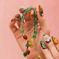 Kuku Akrilik Tempel Gaya Oriental Cina Baru Desain Bunga Putih 3D Berhias Berlian Imitasi Hijau Amber Berlapis Emas Dapat Disesuaikan
