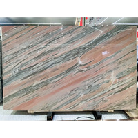 Dalles de marbre rose de luxe avec veines noires pour la décoration des murs et des sols des villas