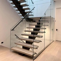 Escalier flottant moderne d'intérieur de haute qualité avec poutre en acier droite et garde-corps à câbles